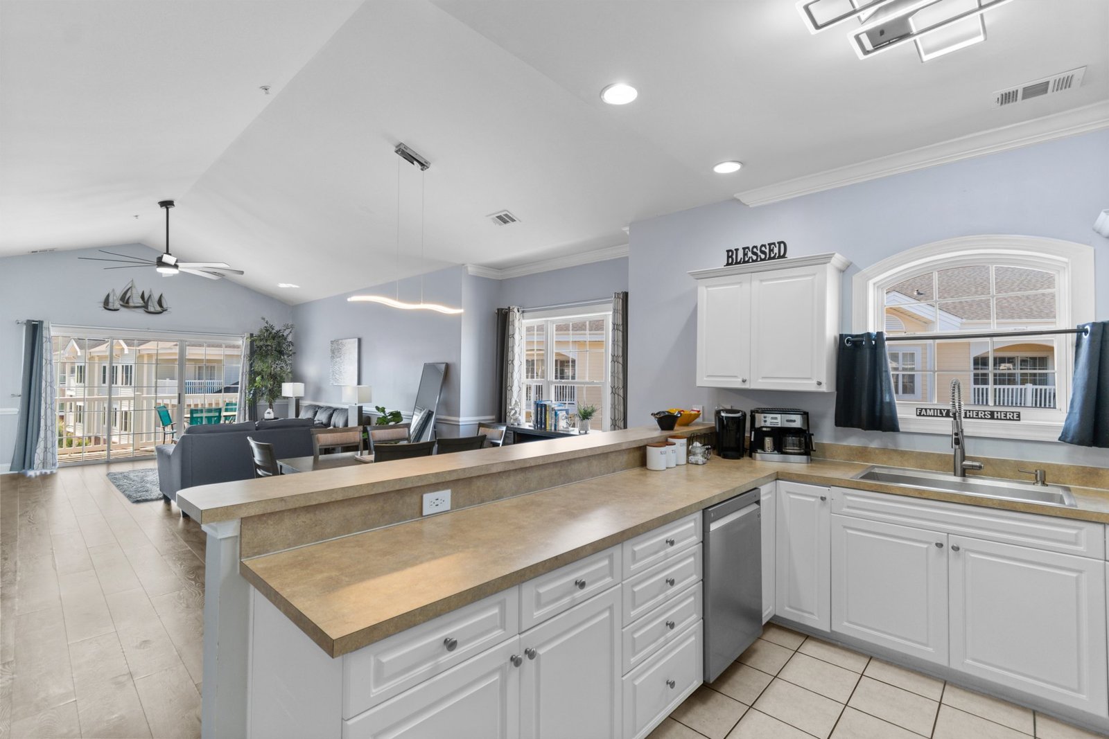 Open kitchen and dining room inside JM Villas